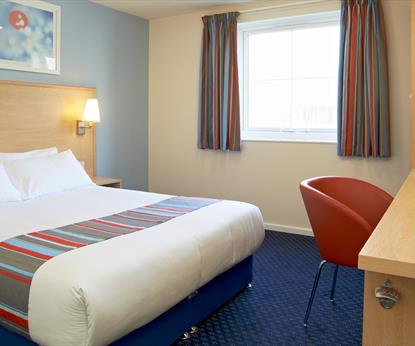 A bedroom in Travelodge