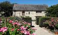 1620s House & Garden outside with flowers