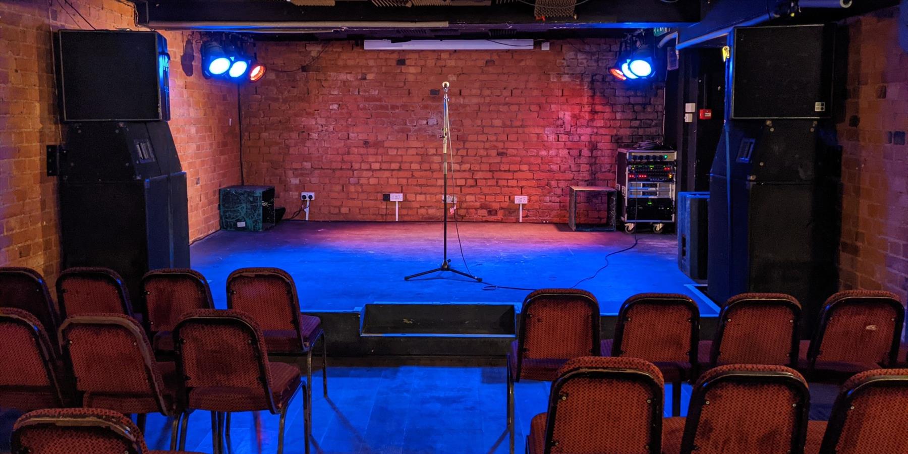 A stage with chairs