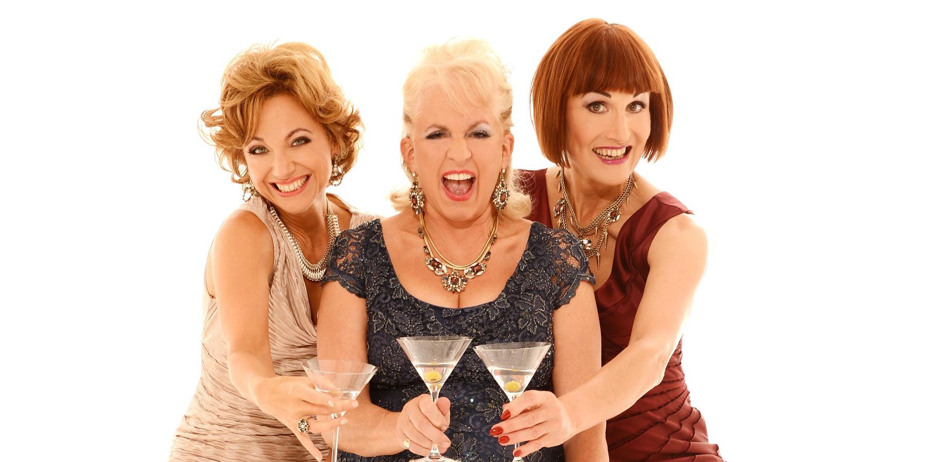Three ladies with cocktail glasses