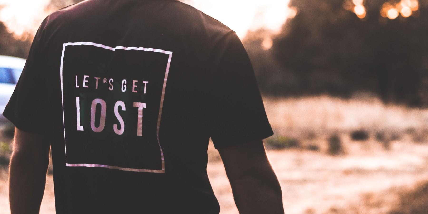 Man with Let's Get Lost T-shirt