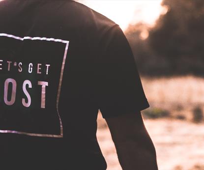 Man with Let's Get Lost T-shirt