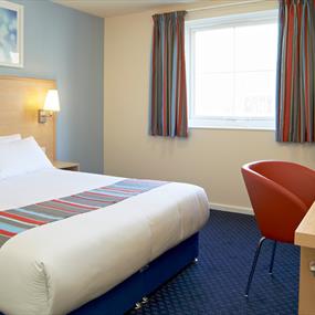A bedroom in Travelodge