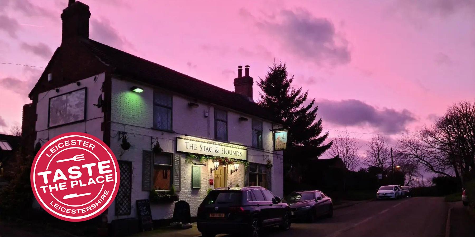 The Stag and Hounds pub under a sunset