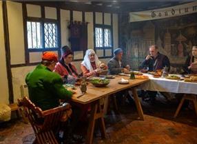People in Medieval Dress enjoying a feast