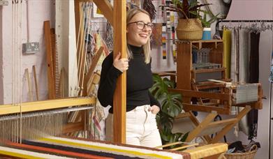 Weaver Siobhan with her loom