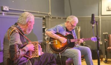 Folk musicians, Robb Johnson and Roger Watson