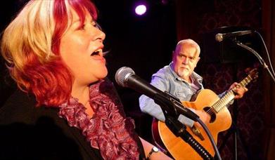 Folk musicians Sally Ironmonger and Brian Carter