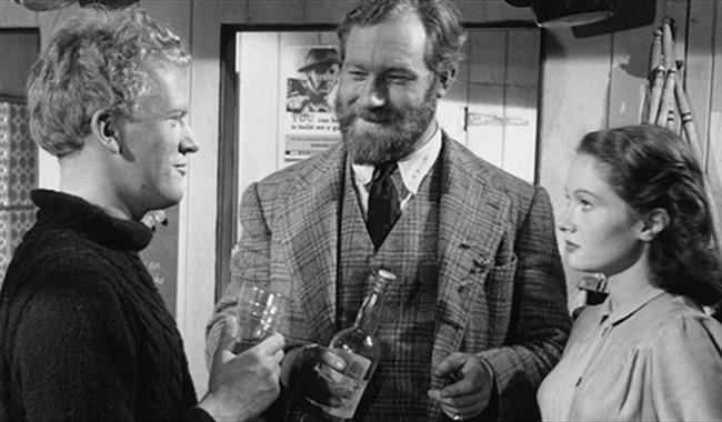 Actors Gordon Jackson, James Robertson Justice and Joan Greenwood in Whisky Galore!


