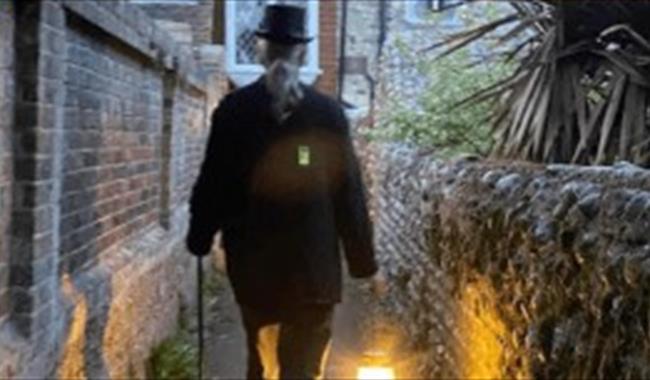 Ghostly figure walking along a twitten in Lewes