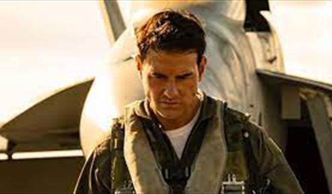 Tom Cruise, starring in Maverick