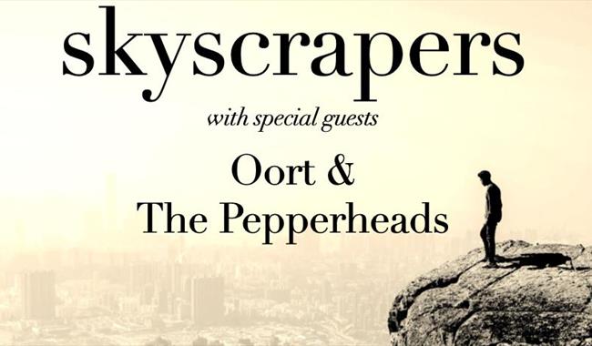 Poster featuring image of man on a cliff edge overlooking cityscape