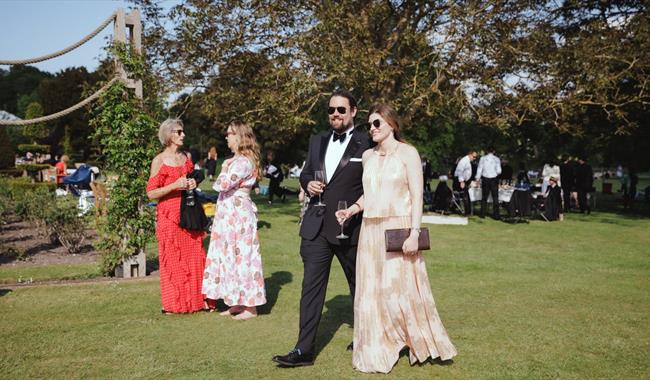 Opera goers in Glyndebourne's gardens