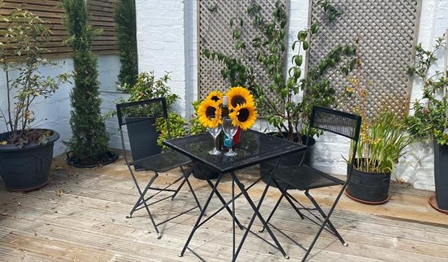 Garden terrace with sunflowers