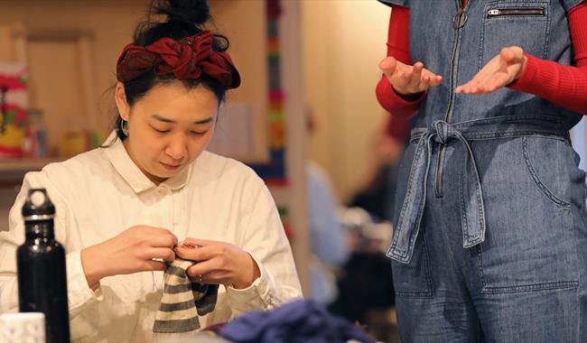 Darning in progress