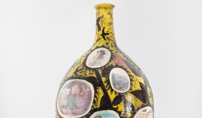 Ceramic created by Grayson Perry featuring images of people in domestic situations