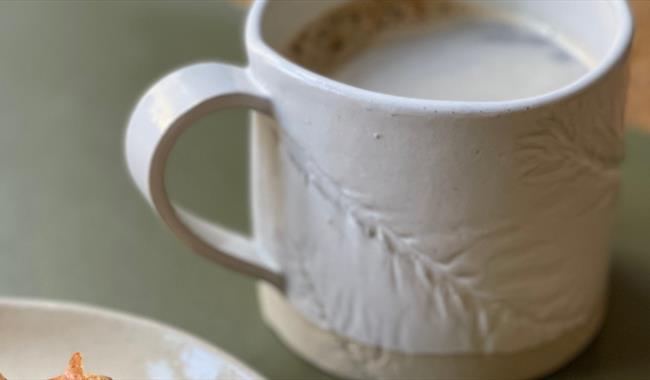 hand crafted clay mug and plate