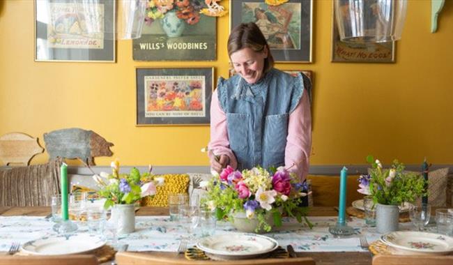 Hamsey Belle decorating an Easter table