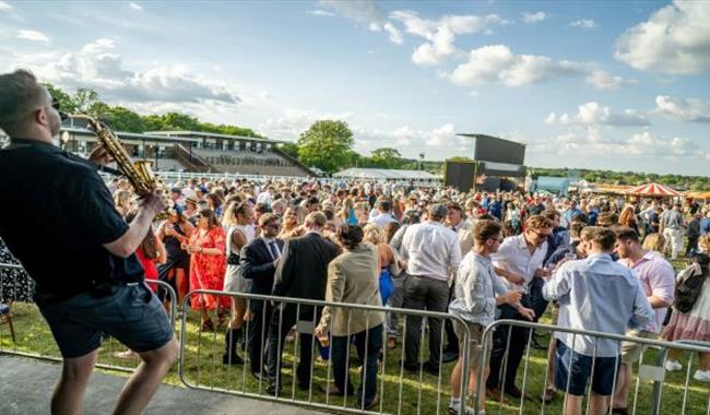 Musician performing at Plumpton Racecourse
