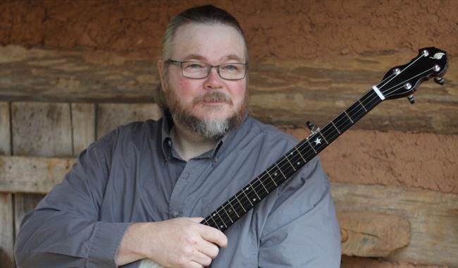Musician Riley Baugus with his banjo