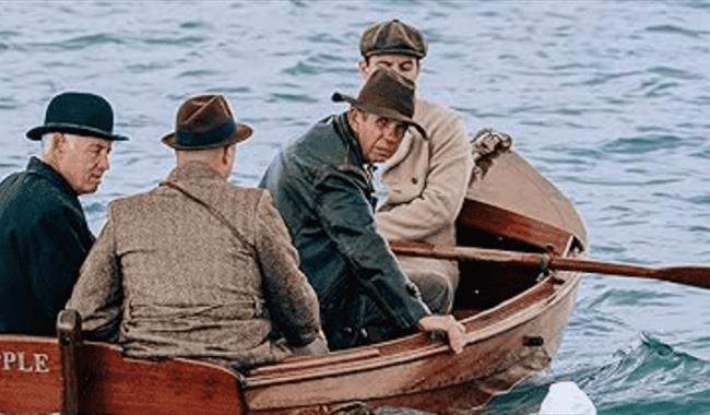 Photo taken from film featuring 4 men in a boat