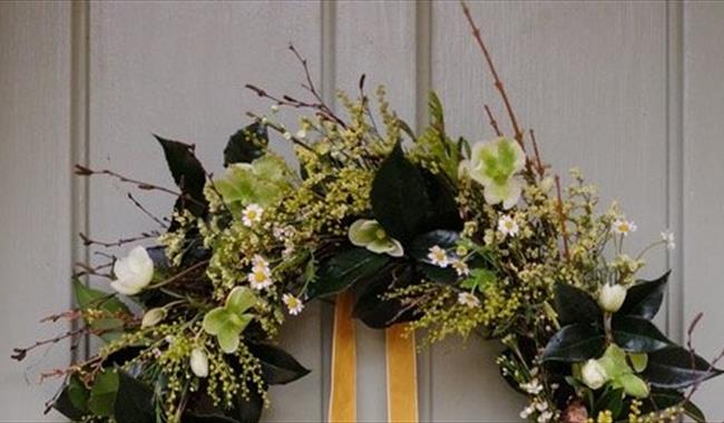 Spring wreath hanging on a door