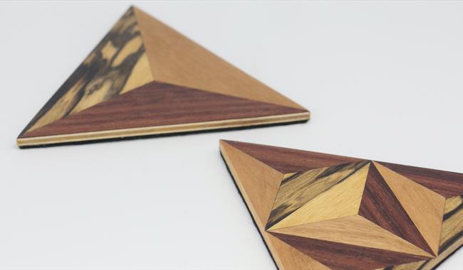 a pair of marquetry coasters