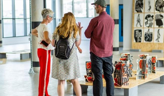 People visiting Artwave exhibition