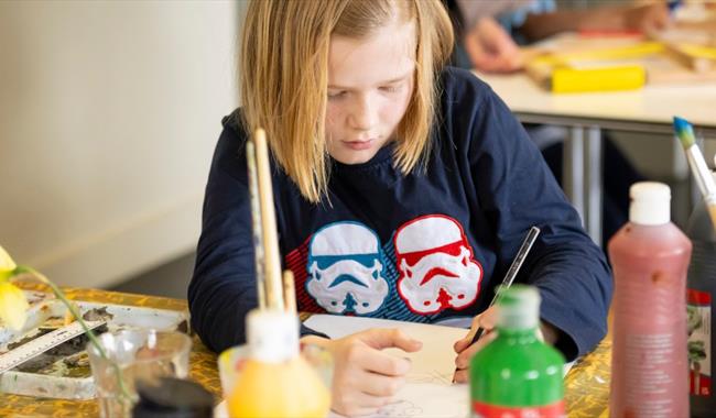 Child doing craft activities