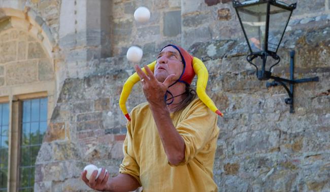 A juggling jester