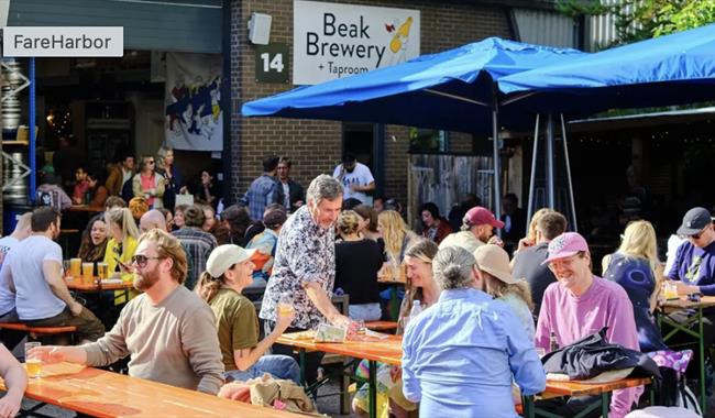 People enjoying refreshment outside at Beak Brewery