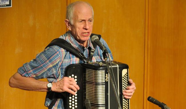Folk musician, John Kirkpatrick with his accordion