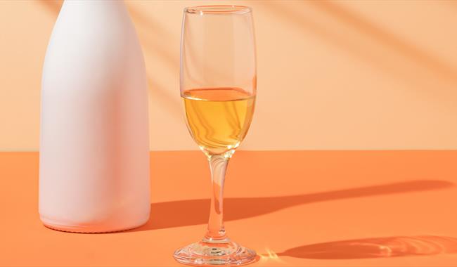 Glass of orange wine