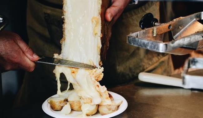 Raclette with gooey cheese