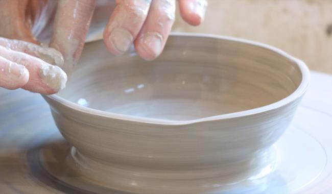 Working at a potters wheel
