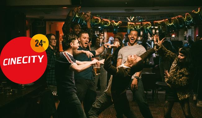 Young people celebrating a birthday at a party