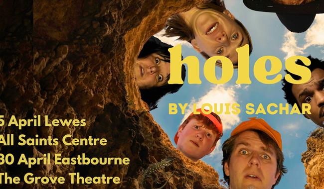 5 characters staring down a hole - photographed from the bottom of the hole!