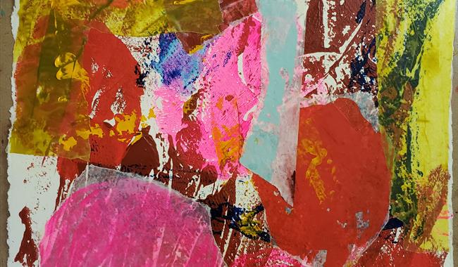 Abstract artwork in pinks, golds and reds