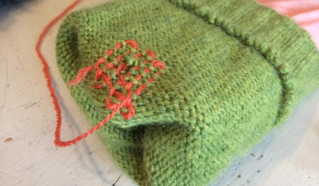 Visible darning in progress