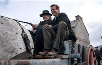 Padraic and Colm on a cart - Banshees of Inisherin.