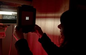 Reviewing black and white photography in a Darkroom