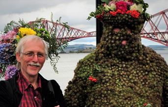 Folk musician Doc Rowe with 'friend'