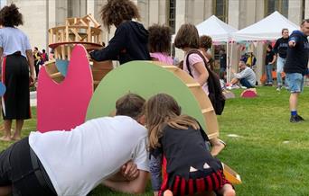 Family groups taking part in Free Form activities