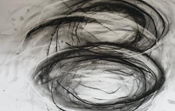 Artwork depicting Art in Motion - 2 intertwining charcoal swirls