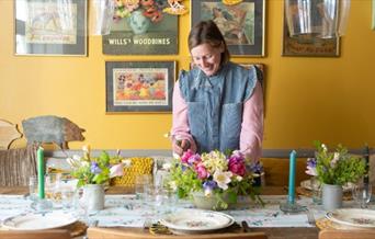 Hamsey Belle decorating an Easter table