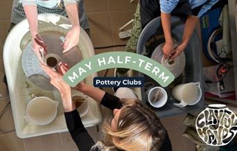 people making pottery using a wheel