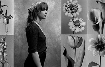 B/w photo of woman with floral / botanical images
