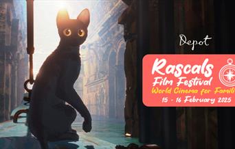 Silhouette of a cartoon cat in city setting