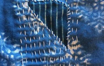 Sashiko mending on fabric