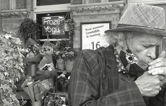 Black and white photo of poet John Agard